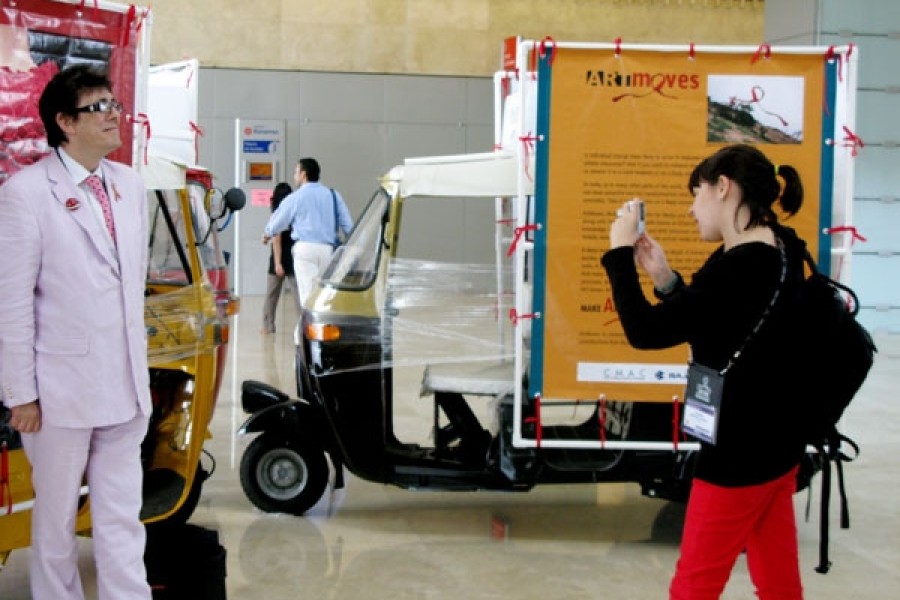 Visitors photographing the ArtMoves installation during the XVII International AIDS Conference