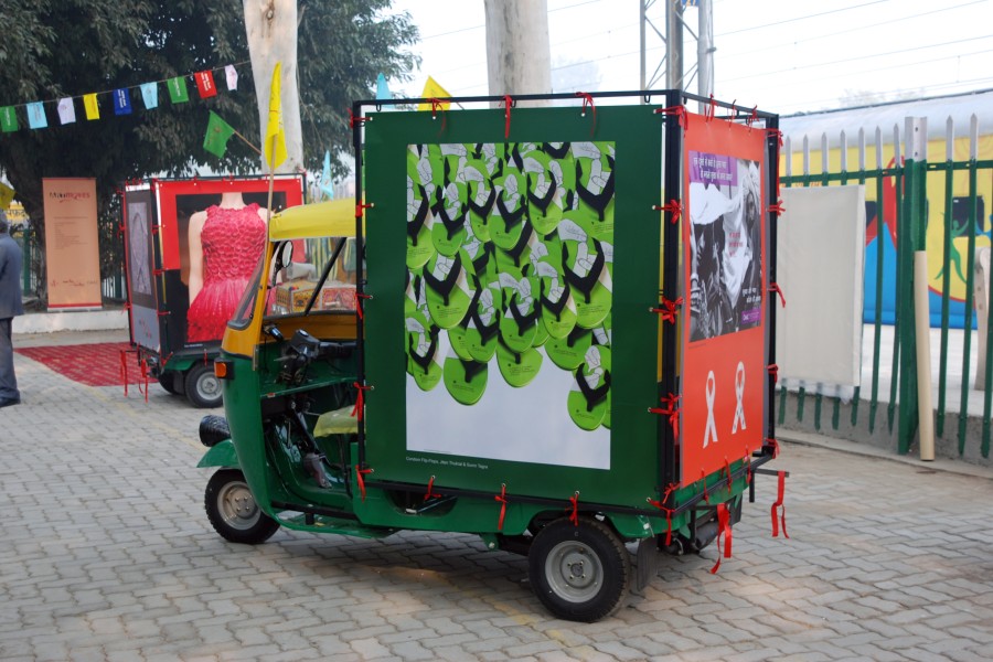 Artwork by AIDS activists displayed on an ArtMoves auto-rickshaw
