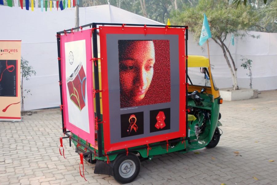 Artwork by AIDS activists displayed on an ArtMoves auto-rickshaw