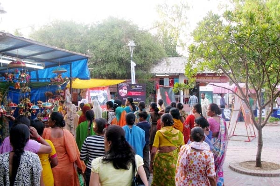 Visitors at the ArtMoves installation at the Dilli Haat open-air market