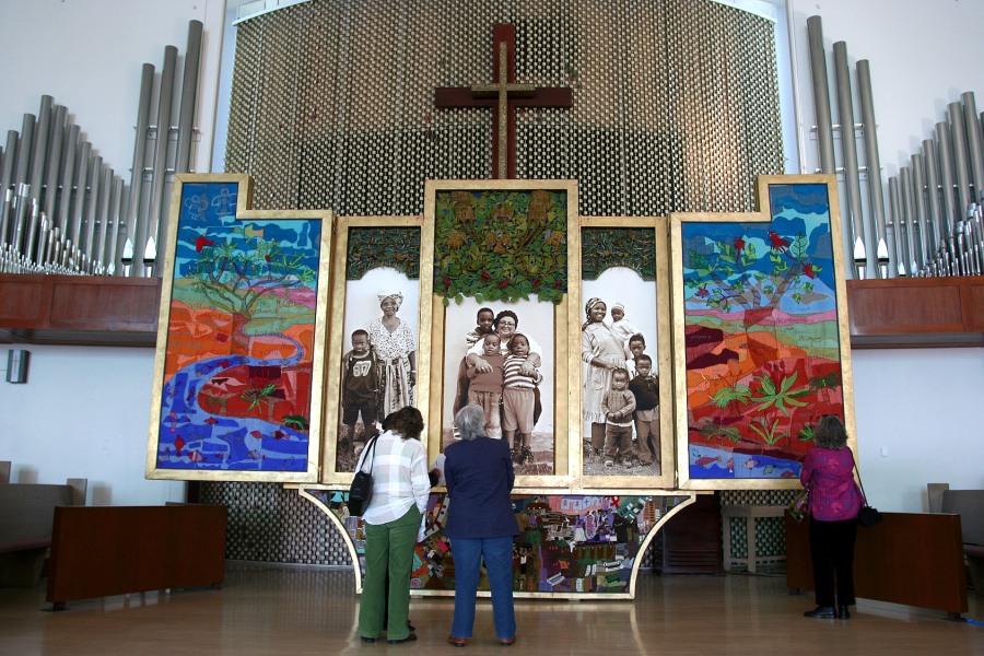 Audience viewing the fully opened Keiskamma Altarpiece at Holman United Methodist Church