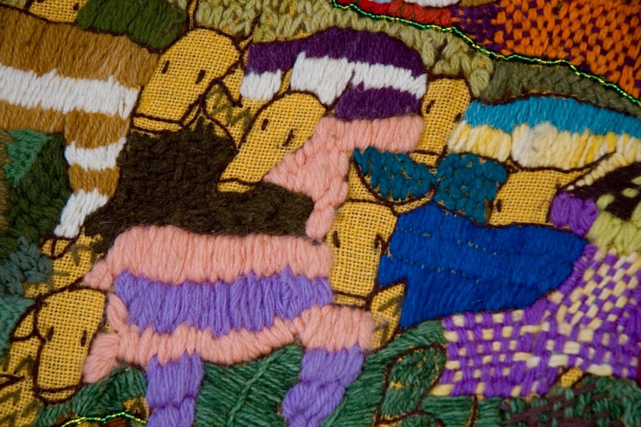 Embroidered wildlife and landscape in the second layer of the Keiskamma Altarpiece