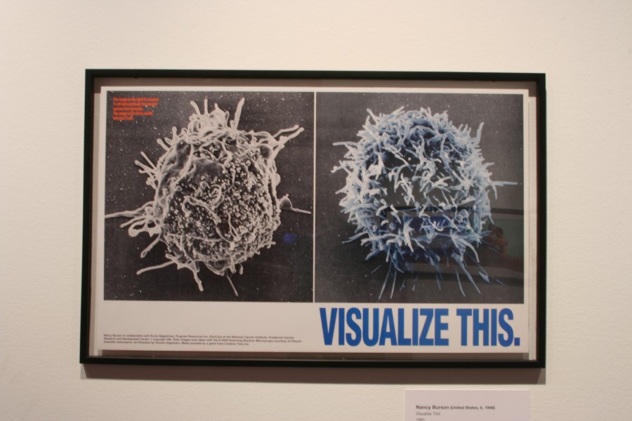 Nancy Burson’s Visualize This poster comparing a healthy T cell and an HIV-infected T cell