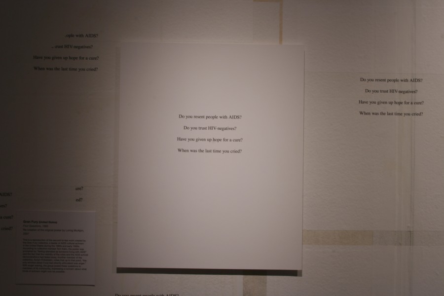 Gran Fury’s *Four Questions* poster, re-created by Loring McAlpin in 2007