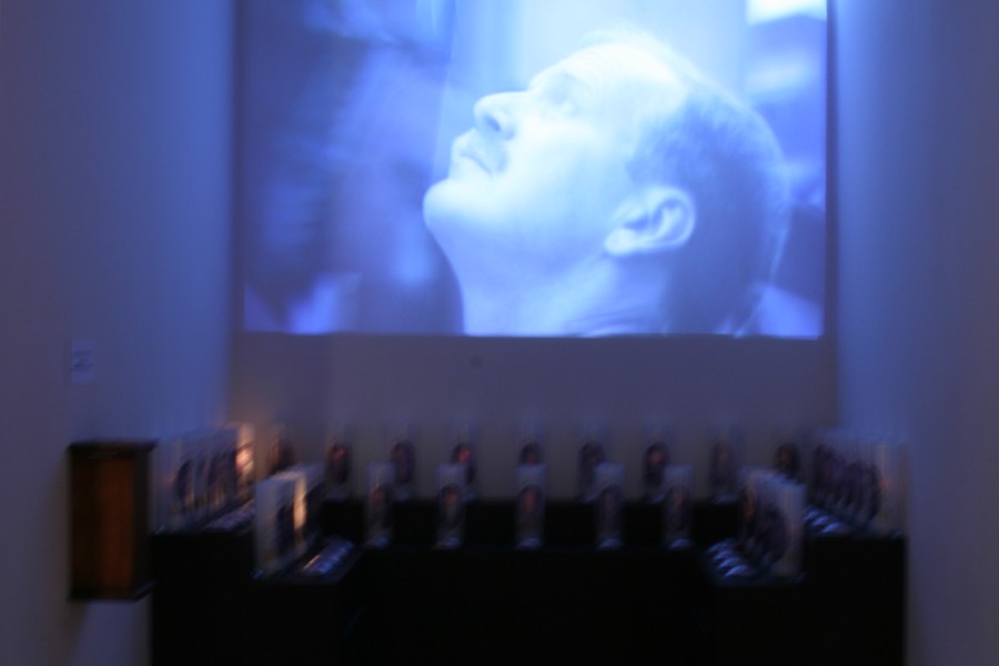 Jean Carlomusto’s interactive-media work *Offerings* accompanied by an offering display