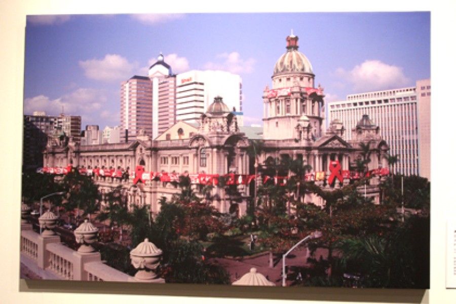 Angie Buckland’s photograph *Durban Art Gallery Red Ribbon installation* displayed in the exhibition