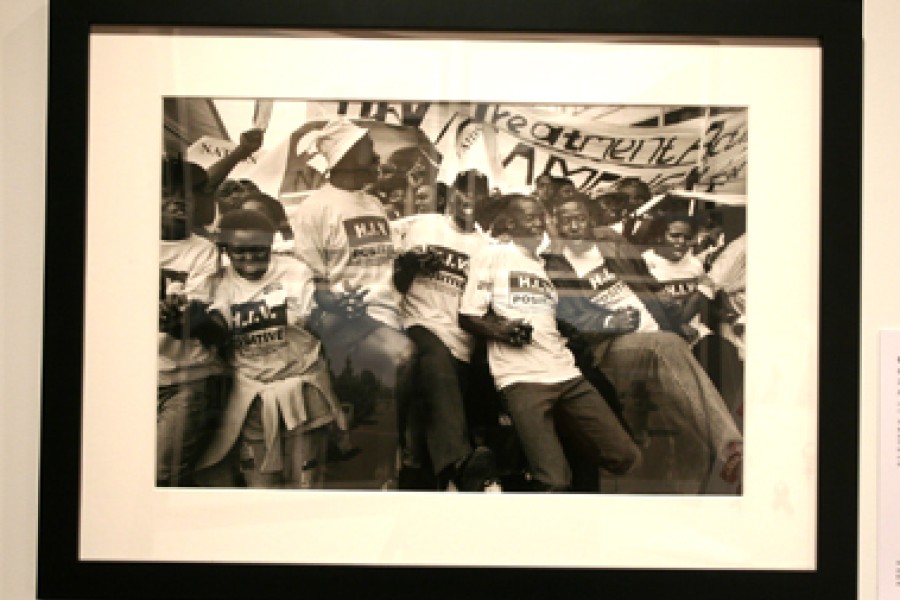 Gideon Mendel’s photograph *Breaking the Silence* displayed in the exhibition