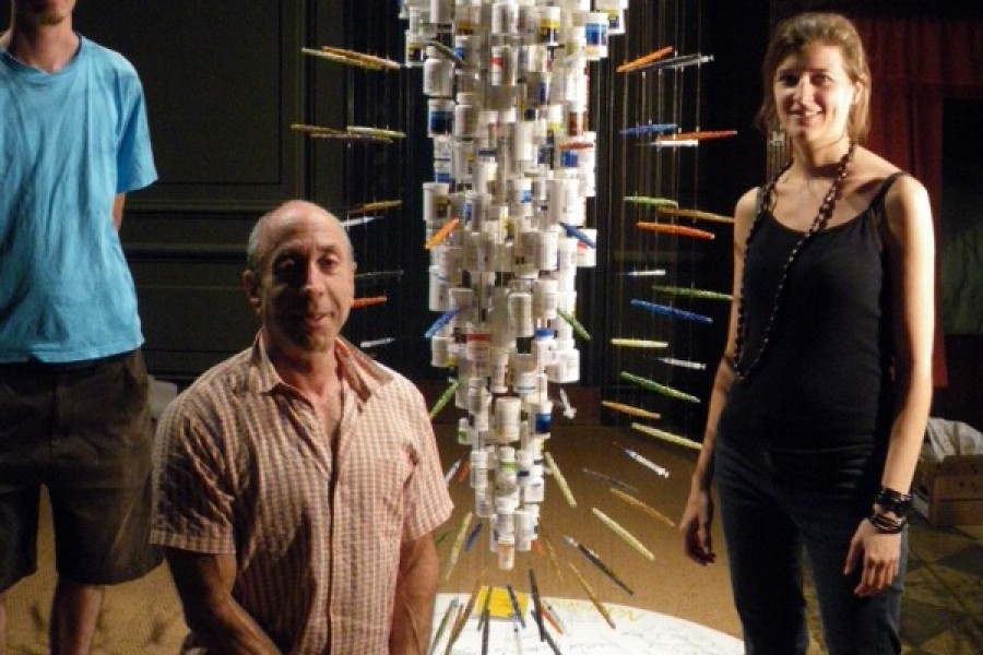 Daniel Goldstein, John Kapellas, and another person beside *Medicine Man*