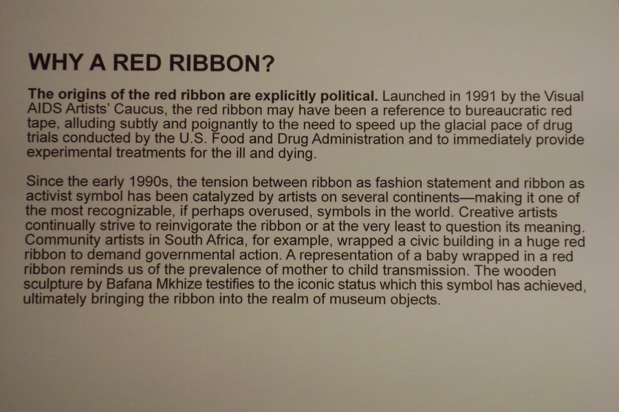 Wall text for the “Why a Red Ribbon?” section