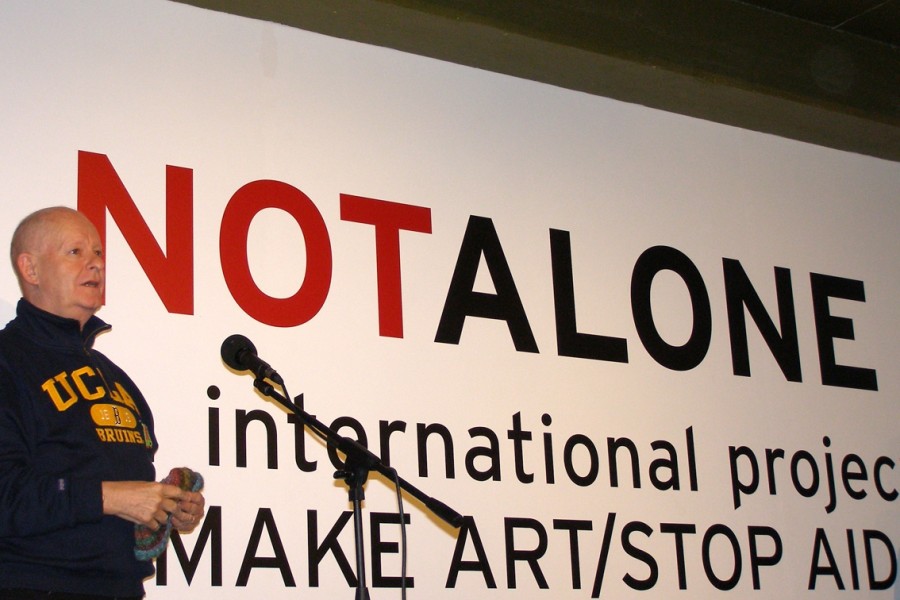 Speaker at the *Not Alone* opening