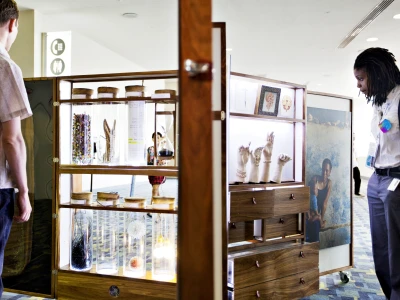 Visitors Obsering the A.R.T. Cabinet