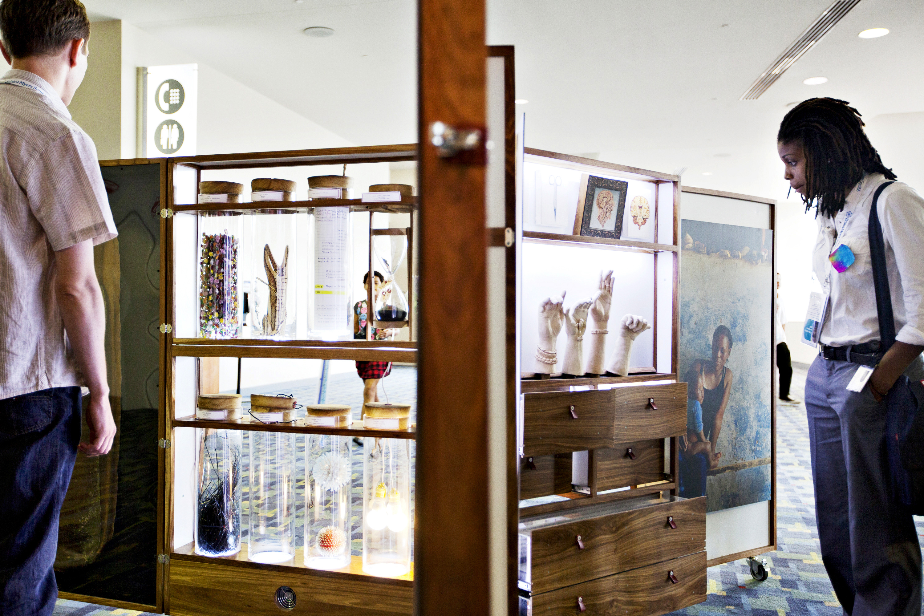 Visitors Obsering the A.R.T. Cabinet