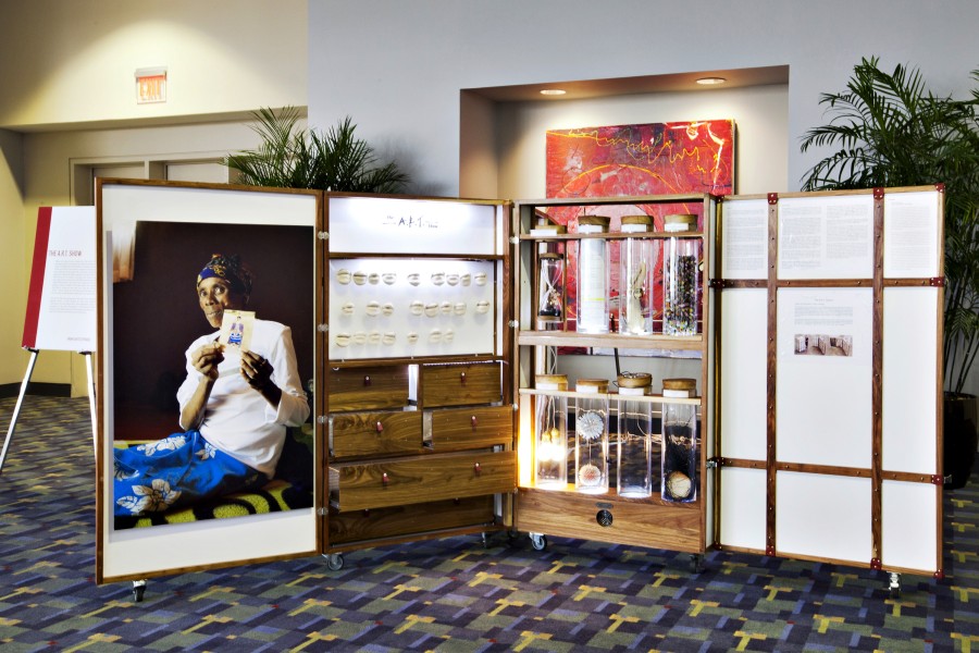 Section of The A.R.T. Cabinet with test tubes and mouth sculptures