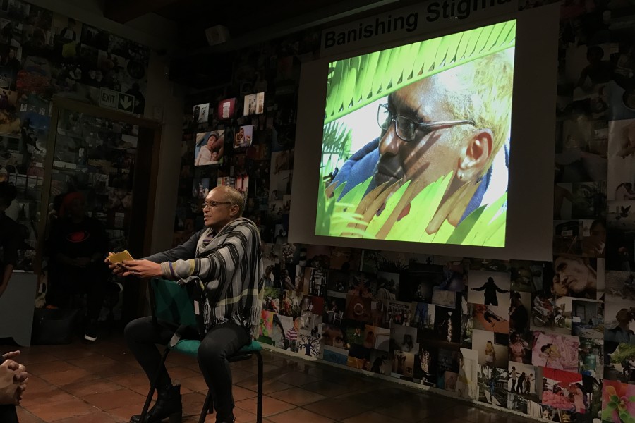 A Through Positive Eyes artivist sharing a personal story during live storytelling