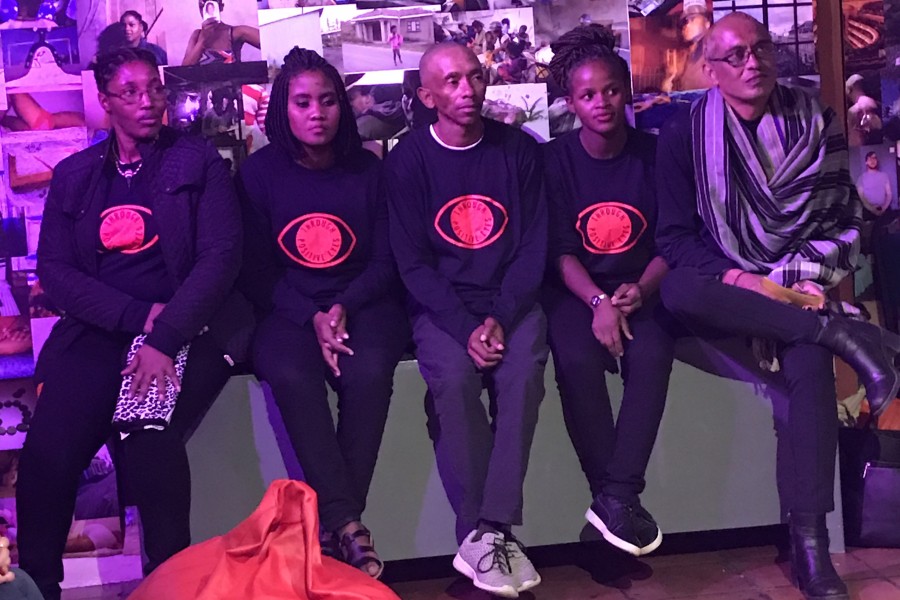 Through Positive Eyes artivists seated in the Banishing Stigma Room