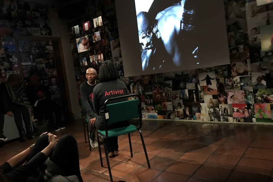 Through Positive Eyes artivist Basil sharing a personal story in the Banishing Stigma Room