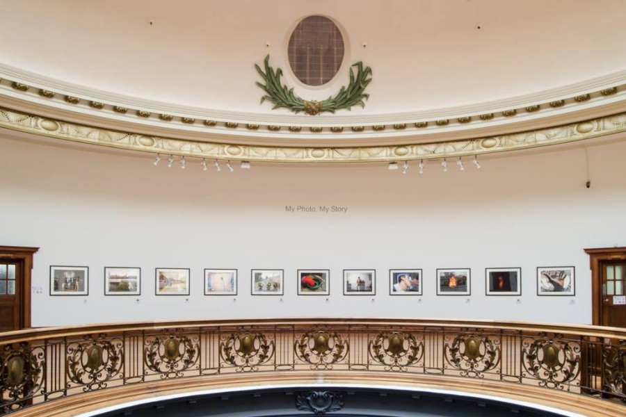 Wide view of the central gallery with the *My Photo. My Story.* header above framed photographs