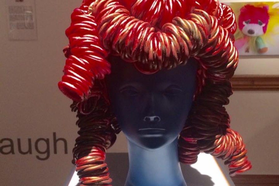 Adriana Bertini’s brightly colored condom headdress *Mind Experiment #1*