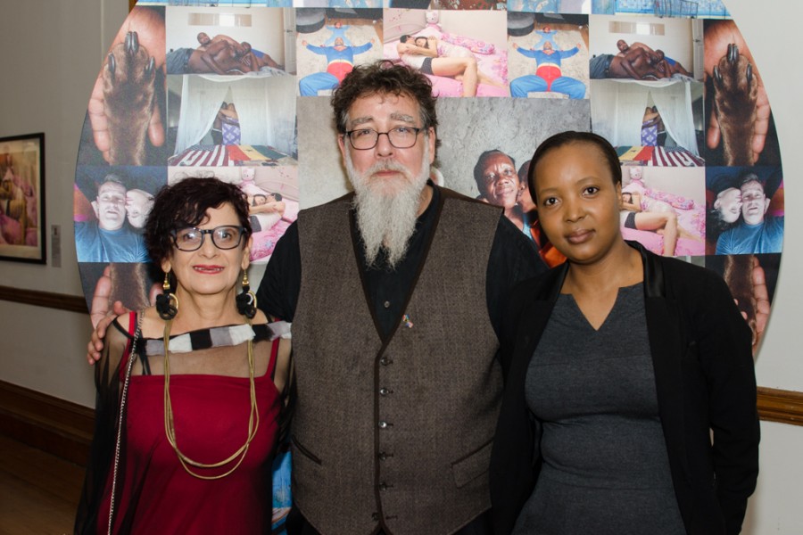 Carol Brown and Stan Pressner with a woman at the exhibition opening