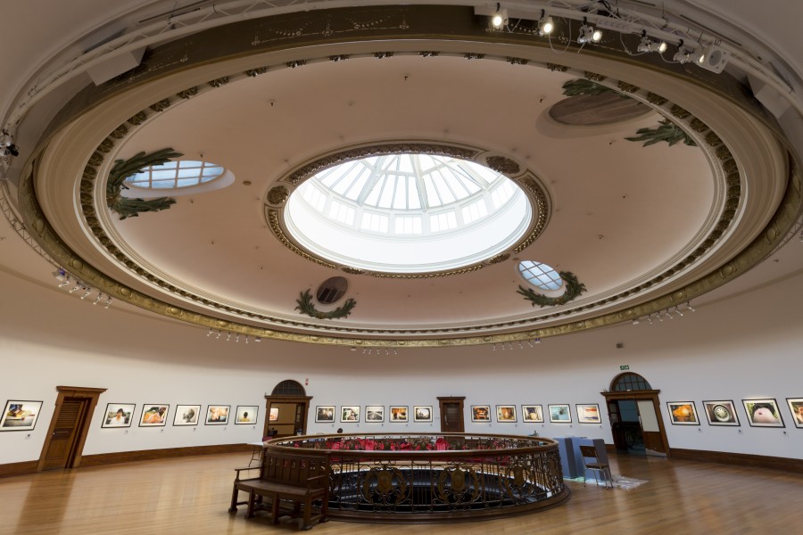 Photographs by Through Positive Eyes artivists in the circular gallery of the Edwardian-inspired Durban City Hall