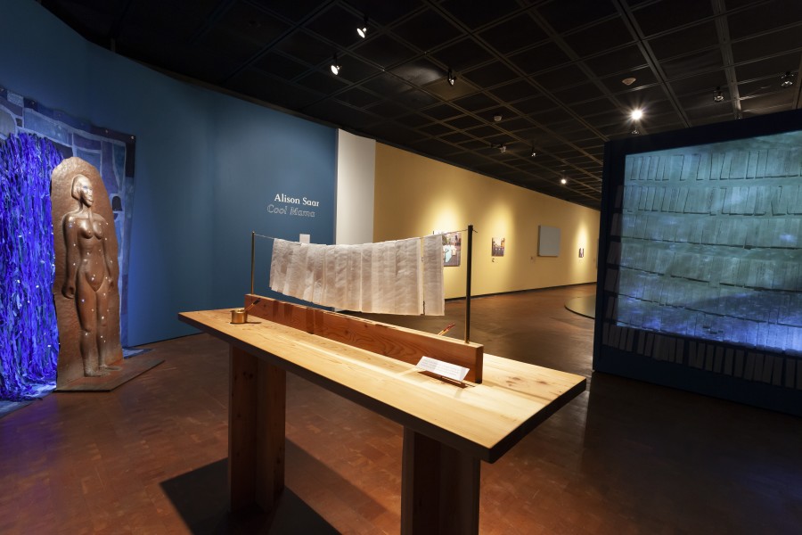 Writing station with long, thin sheets of paper for reflections