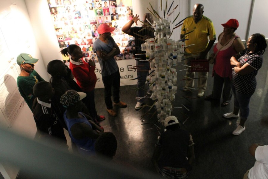 Visitor at Through Positive Eyes Johannesburg Exhibit