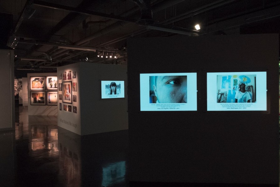 Gallery view with a selection of photographs by Through Positive Eyes artivists