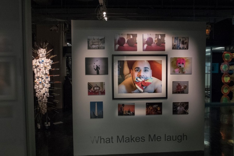 Isaac’s photograph above the *What Makes Me Laugh* section heading, surrounded by selected images