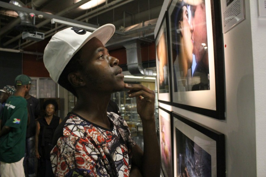 Visitor at Through Positive Eyes Johannesburg Exhibit