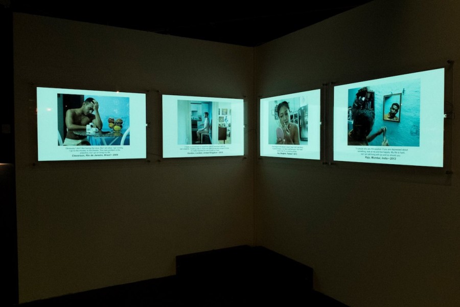 Gallery view with a selection of photographs by Through Positive Eyes artivists