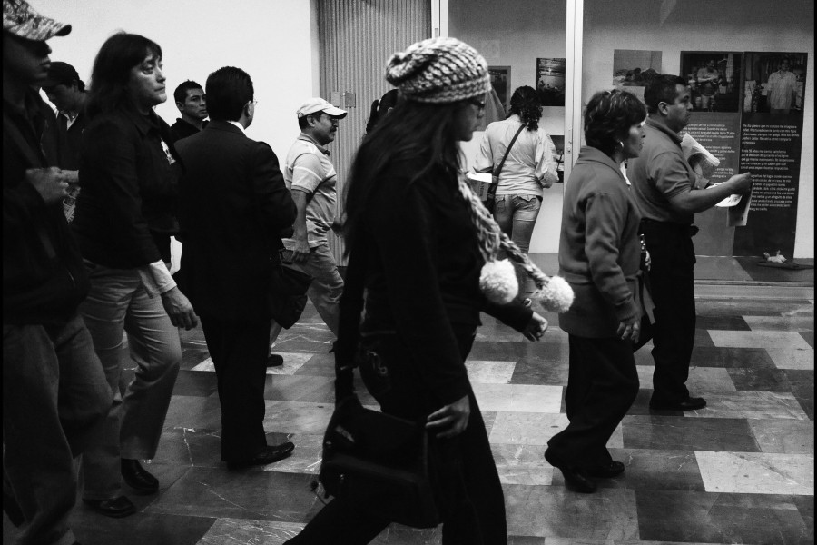 People Walking by the Through Positive Eyes Mexico City Metro Exhibition