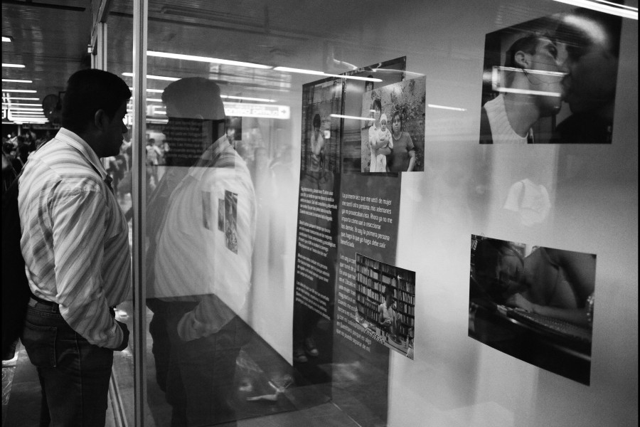 Through Positive Eyes Mexico City Metro Exhibition & Man Viewing