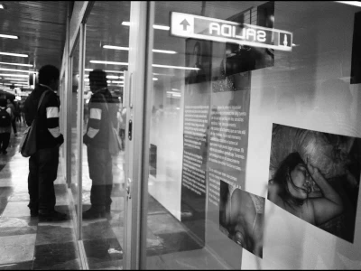 Through Positive Eyes Mexico City Metro Exhibition & Man Viewing