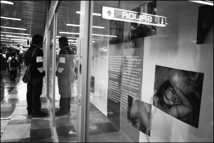 Through Positive Eyes Mexico City Metro Exhibition & Man Viewing
